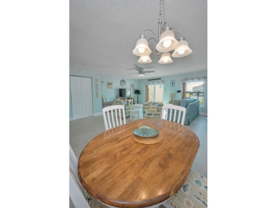 WELCOME TO DUNEDIN'S WATERFRONT COMMUNITY OF MEDITERRANEAN on The Dunedin Country Club in Florida - for sale on GolfHomes.com, golf home, golf lot