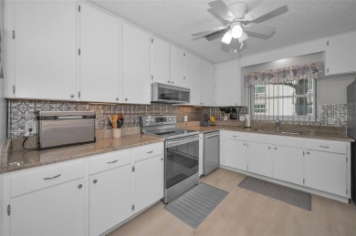 WELCOME TO DUNEDIN'S WATERFRONT COMMUNITY OF MEDITERRANEAN on The Dunedin Country Club in Florida - for sale on GolfHomes.com, golf home, golf lot