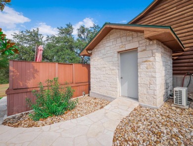 This stunning log cabin features 3 bedrooms, 2 bathrooms, and on Lago Vista Golf Club in Texas - for sale on GolfHomes.com, golf home, golf lot