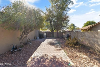 This beautifully designed home features 3 bedrooms, 2 bathrooms on Gainey Ranch Golf Club in Arizona - for sale on GolfHomes.com, golf home, golf lot