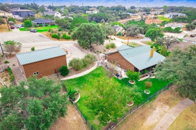 This stunning log cabin features 3 bedrooms, 2 bathrooms, and on Lago Vista Golf Club in Texas - for sale on GolfHomes.com, golf home, golf lot