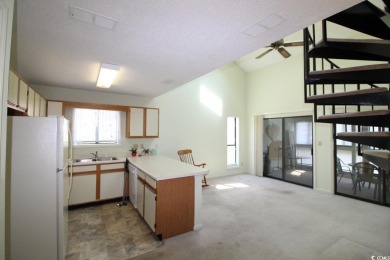 This top floor, end unit, 2BR/2BA condominium at Island Green on Island Green Golf Club in South Carolina - for sale on GolfHomes.com, golf home, golf lot