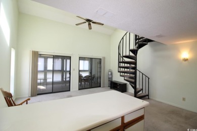 This top floor, end unit, 2BR/2BA condominium at Island Green on Island Green Golf Club in South Carolina - for sale on GolfHomes.com, golf home, golf lot