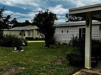Charming 1982 Palm double-wide manufactured home located in the on Rolling Greens Executive Golf Community in Florida - for sale on GolfHomes.com, golf home, golf lot