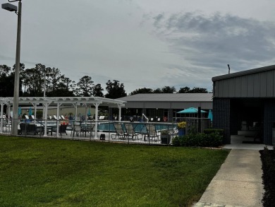 Charming 1982 Palm double-wide manufactured home located in the on Rolling Greens Executive Golf Community in Florida - for sale on GolfHomes.com, golf home, golf lot