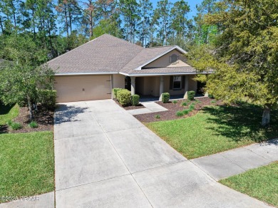 This spacious 3 Bedroom home is located in the highly esteemed on Plantation Bay Golf and Country Club in Florida - for sale on GolfHomes.com, golf home, golf lot