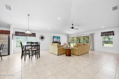 This spacious 3 Bedroom home is located in the highly esteemed on Plantation Bay Golf and Country Club in Florida - for sale on GolfHomes.com, golf home, golf lot