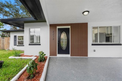 Prime location in the heart of Dunedin! 3-bedroom, 2-bath home on The Dunedin Country Club in Florida - for sale on GolfHomes.com, golf home, golf lot