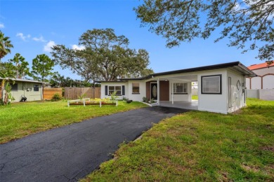 Prime location in the heart of Dunedin! 3-bedroom, 2-bath home on The Dunedin Country Club in Florida - for sale on GolfHomes.com, golf home, golf lot