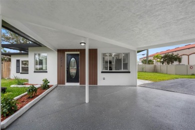 Prime location in the heart of Dunedin! 3-bedroom, 2-bath home on The Dunedin Country Club in Florida - for sale on GolfHomes.com, golf home, golf lot