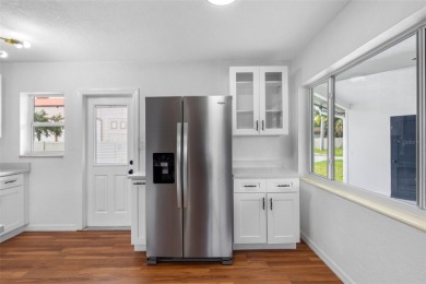 Prime location in the heart of Dunedin! 3-bedroom, 2-bath home on The Dunedin Country Club in Florida - for sale on GolfHomes.com, golf home, golf lot