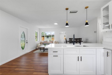 Prime location in the heart of Dunedin! 3-bedroom, 2-bath home on The Dunedin Country Club in Florida - for sale on GolfHomes.com, golf home, golf lot