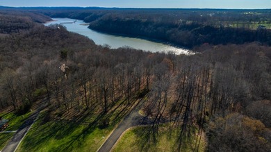 Beautiful 0.5-acre wooded building lot located in the gated on Links At Lily Creek Resort in Kentucky - for sale on GolfHomes.com, golf home, golf lot