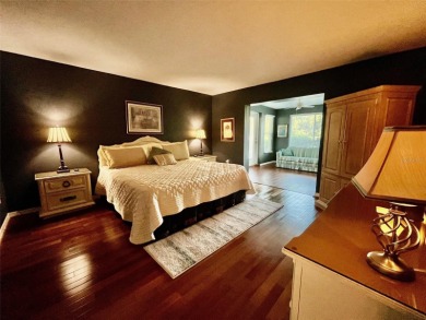 Golf Course Views, Lake Tarpon Strolls, and Minutes to the on Tarpon Woods Golf Club in Florida - for sale on GolfHomes.com, golf home, golf lot