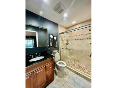 Golf Course Views, Lake Tarpon Strolls, and Minutes to the on Tarpon Woods Golf Club in Florida - for sale on GolfHomes.com, golf home, golf lot