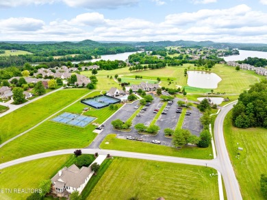 An incredible opportunity to own a prime 0.4-acre lakefront lot on Rarity Bay Country Club - Loudon in Tennessee - for sale on GolfHomes.com, golf home, golf lot