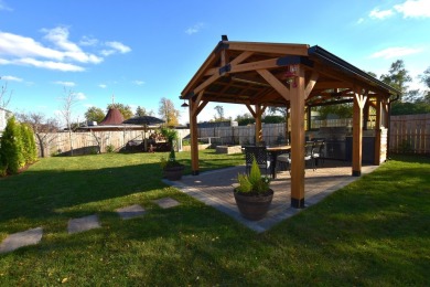 This exquisite, four-bedroom home, nestled in a serene Downers on Green Meadows Golf Club in Illinois - for sale on GolfHomes.com, golf home, golf lot