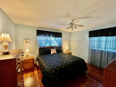 Golf Course Views, Lake Tarpon Strolls, and Minutes to the on Tarpon Woods Golf Club in Florida - for sale on GolfHomes.com, golf home, golf lot
