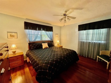 Golf Course Views, Lake Tarpon Strolls, and Minutes to the on Tarpon Woods Golf Club in Florida - for sale on GolfHomes.com, golf home, golf lot