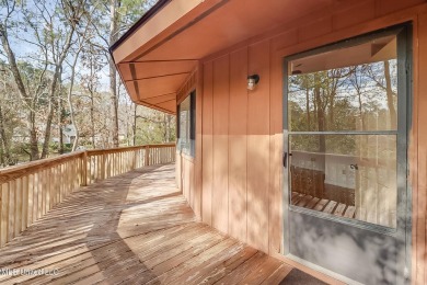 Calling all nature lovers!  Versatile two story Topsider home on Diamondhead Country Club in Mississippi - for sale on GolfHomes.com, golf home, golf lot