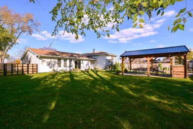 This exquisite, four-bedroom home, nestled in a serene Downers on Green Meadows Golf Club in Illinois - for sale on GolfHomes.com, golf home, golf lot