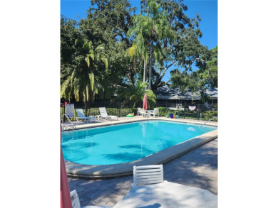 Golf Course Views, Lake Tarpon Strolls, and Minutes to the on Tarpon Woods Golf Club in Florida - for sale on GolfHomes.com, golf home, golf lot