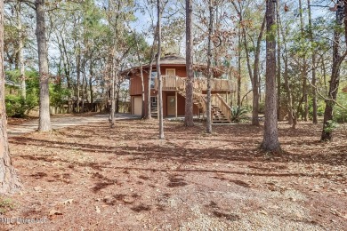 Calling all nature lovers!  Versatile two story Topsider home on Diamondhead Country Club in Mississippi - for sale on GolfHomes.com, golf home, golf lot