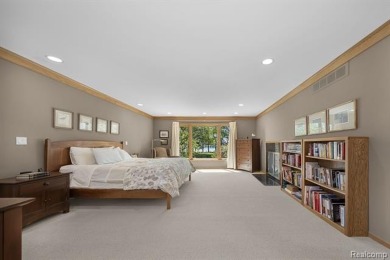 Welcome to your dream home on the shores of private all-sports on Pine Lake Country Club in Michigan - for sale on GolfHomes.com, golf home, golf lot