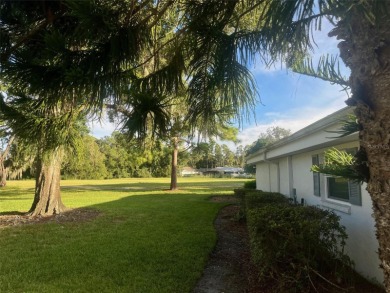 Golf Course Views, Lake Tarpon Strolls, and Minutes to the on Tarpon Woods Golf Club in Florida - for sale on GolfHomes.com, golf home, golf lot
