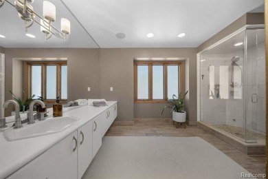 Welcome to your dream home on the shores of private all-sports on Pine Lake Country Club in Michigan - for sale on GolfHomes.com, golf home, golf lot