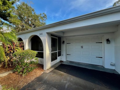 Golf Course Views, Lake Tarpon Strolls, and Minutes to the on Tarpon Woods Golf Club in Florida - for sale on GolfHomes.com, golf home, golf lot
