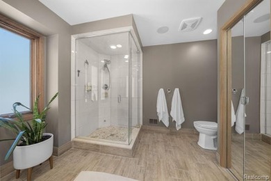 Welcome to your dream home on the shores of private all-sports on Pine Lake Country Club in Michigan - for sale on GolfHomes.com, golf home, golf lot