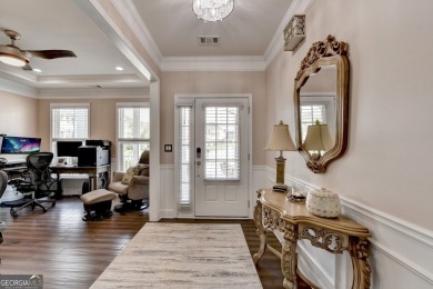 Nestled in a serene cul-de-sac, this meticulously maintained on Reunion Golf Club in Georgia - for sale on GolfHomes.com, golf home, golf lot