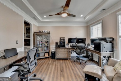Nestled in a serene cul-de-sac, this meticulously maintained on Reunion Golf Club in Georgia - for sale on GolfHomes.com, golf home, golf lot