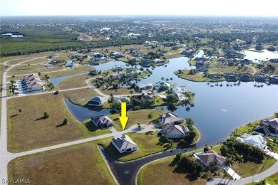 Unwind on the water in this luxurious haven nestled on a quiet on Burnt Store Golf Club in Florida - for sale on GolfHomes.com, golf home, golf lot