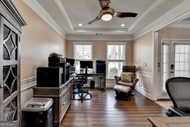 Nestled in a serene cul-de-sac, this meticulously maintained on Reunion Golf Club in Georgia - for sale on GolfHomes.com, golf home, golf lot