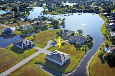 Unwind on the water in this luxurious haven nestled on a quiet on Burnt Store Golf Club in Florida - for sale on GolfHomes.com, golf home, golf lot