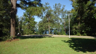 A beautiful water-view home on Toledo Bend Lake.  THIS ONE on Cypress Bend Golf Course in Texas - for sale on GolfHomes.com, golf home, golf lot