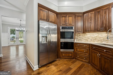 Welcome to this stunning Southern Colonial home offering over 3 on The Club At Osprey Cove in Georgia - for sale on GolfHomes.com, golf home, golf lot