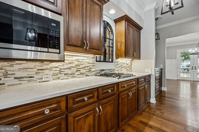 Welcome to this stunning Southern Colonial home offering over 3 on The Club At Osprey Cove in Georgia - for sale on GolfHomes.com, golf home, golf lot