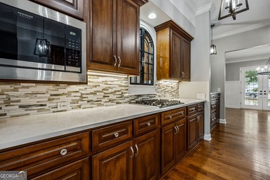 Welcome to this stunning Southern Colonial home offering over 3 on The Club At Osprey Cove in Georgia - for sale on GolfHomes.com, golf home, golf lot