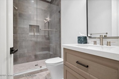Stunning 4 bed, 4.5 bath Tributary Cabin with pond & Teton on Huntsman Springs Golf Club in Idaho - for sale on GolfHomes.com, golf home, golf lot