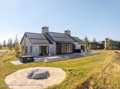 Stunning 4 bed, 4.5 bath Tributary Cabin with pond & Teton on Huntsman Springs Golf Club in Idaho - for sale on GolfHomes.com, golf home, golf lot