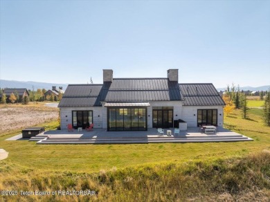 Stunning 4 bed, 4.5 bath Tributary Cabin with pond & Teton on Huntsman Springs Golf Club in Idaho - for sale on GolfHomes.com, golf home, golf lot