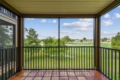 Just Listed!  **This is a second floor elevator accessible on Feather Sound Country Club in Florida - for sale on GolfHomes.com, golf home, golf lot