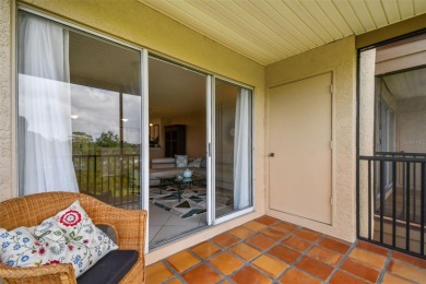 Just Listed!  **This is a second floor elevator accessible on Feather Sound Country Club in Florida - for sale on GolfHomes.com, golf home, golf lot
