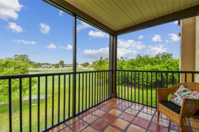Just Listed!  **This is a second floor elevator accessible on Feather Sound Country Club in Florida - for sale on GolfHomes.com, golf home, golf lot