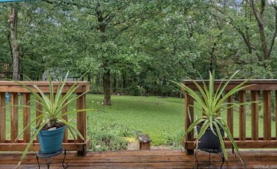 Peaceful Diamondhead Retreat with Golf Course Views  Sunroom on Diamondhead Golf and Country Club in Arkansas - for sale on GolfHomes.com, golf home, golf lot