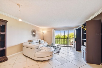 Just Listed!  **This is a second floor elevator accessible on Feather Sound Country Club in Florida - for sale on GolfHomes.com, golf home, golf lot