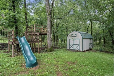 Peaceful Diamondhead Retreat with Golf Course Views  Sunroom on Diamondhead Golf and Country Club in Arkansas - for sale on GolfHomes.com, golf home, golf lot